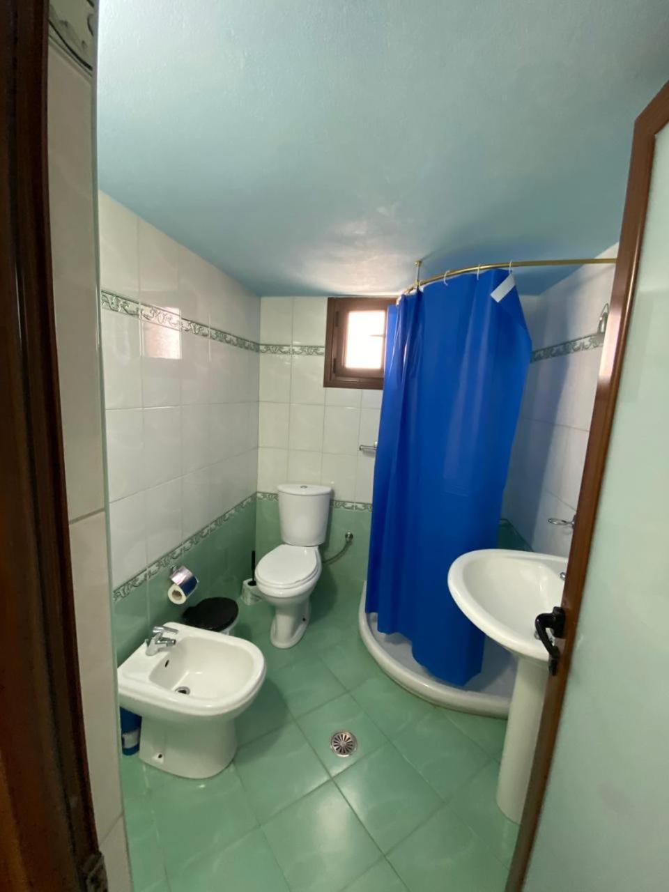 Vila Avni Likometi Ksamil Rom bilde