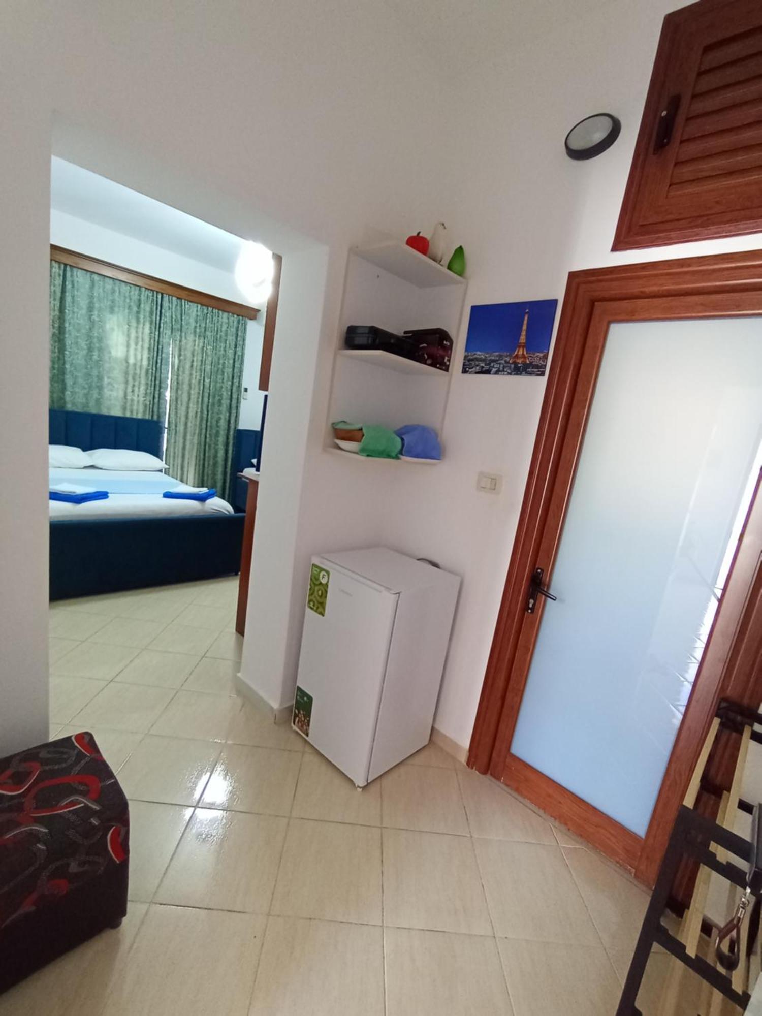 Vila Avni Likometi Ksamil Rom bilde