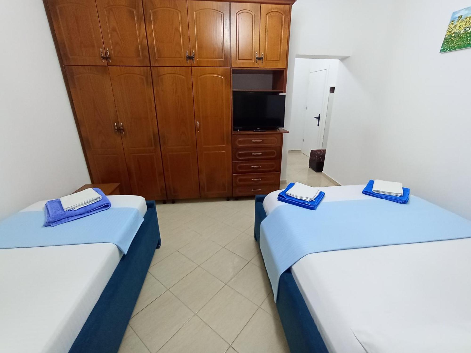 Vila Avni Likometi Ksamil Rom bilde