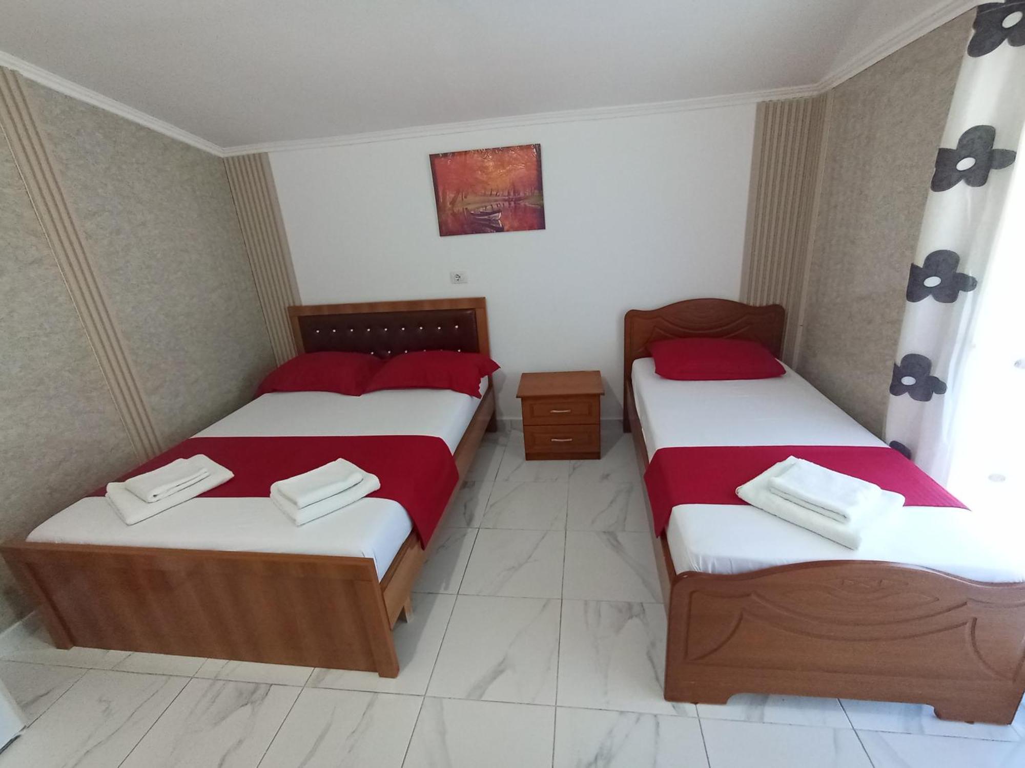 Vila Avni Likometi Ksamil Rom bilde